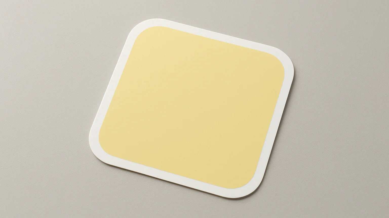 Square studio product photograph of a vinyl decal on a neutral ba